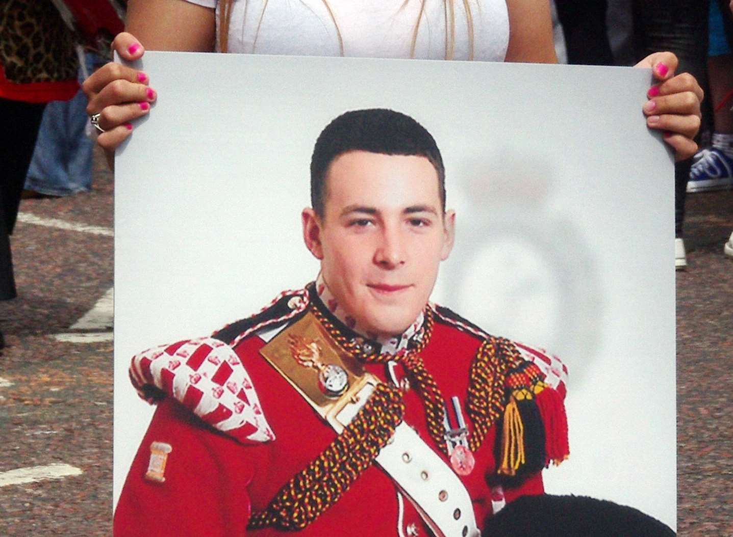 A photo of Lee Rigby was removed from the MOD website following a copyright dispute