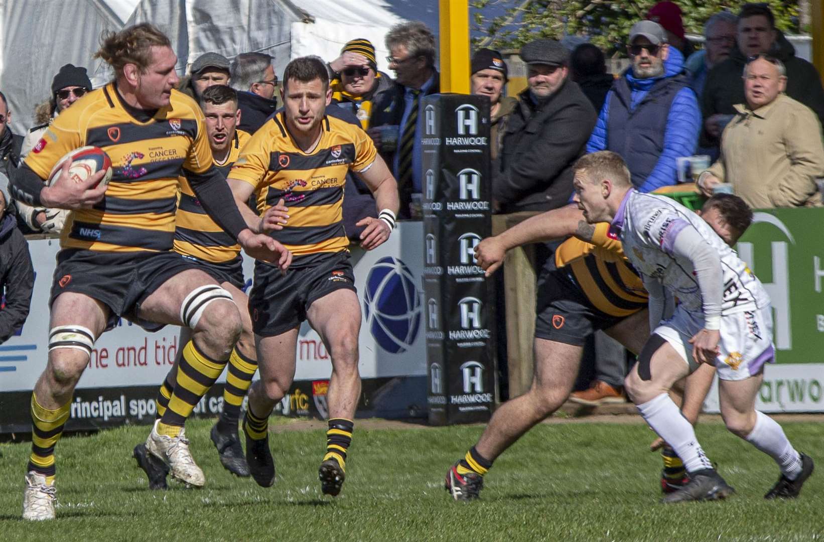 Canterbury's Frank Reynolds battles it out against Clifton. Picture: Phillipa Hilton