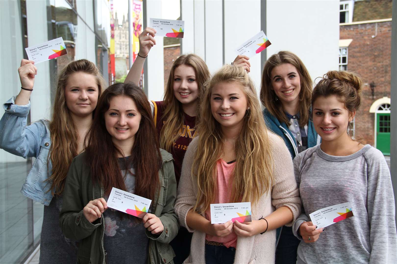 students with their Discovery tickets outside the Marlowe Theatre