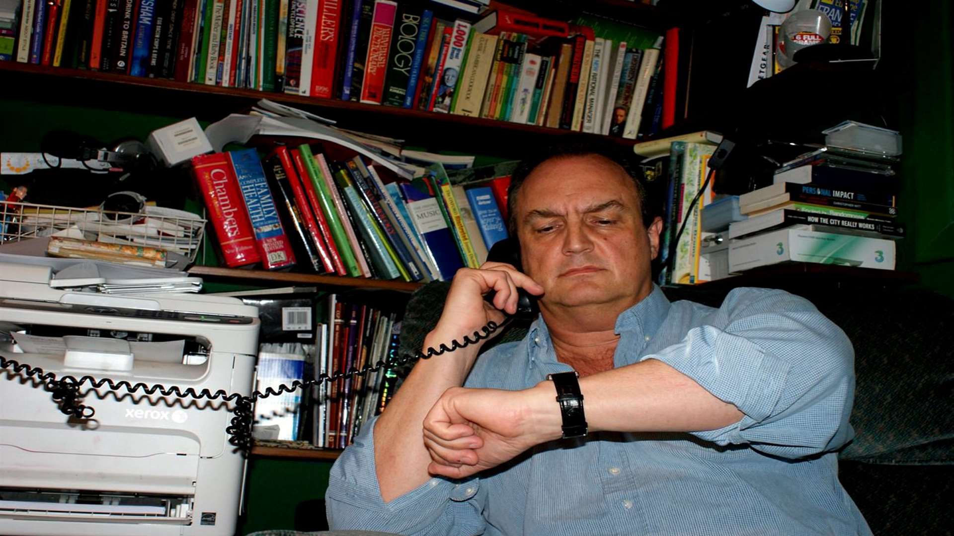Nigel Clarke hanging on the telephone. Picture: SWNS