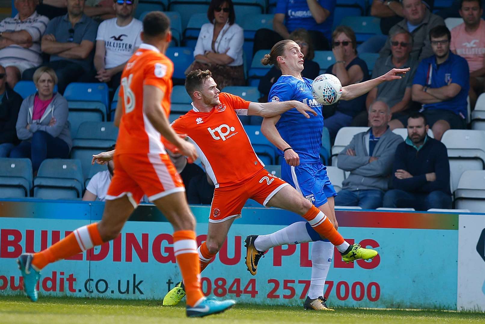 Tom Eaves battles the Tangerines defence Picture: Andy Jones