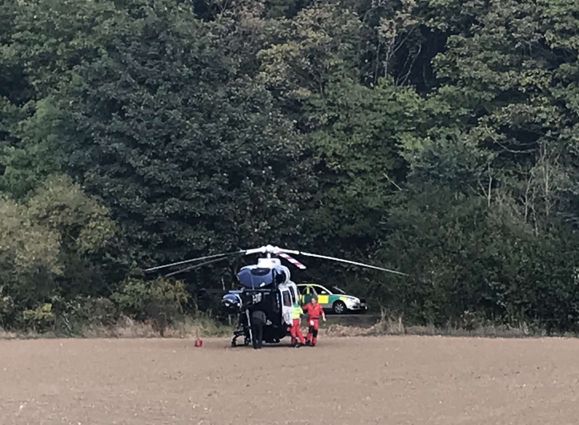 The air ambulance landed in a nearby field. Picture: @cedricelf on Twitter