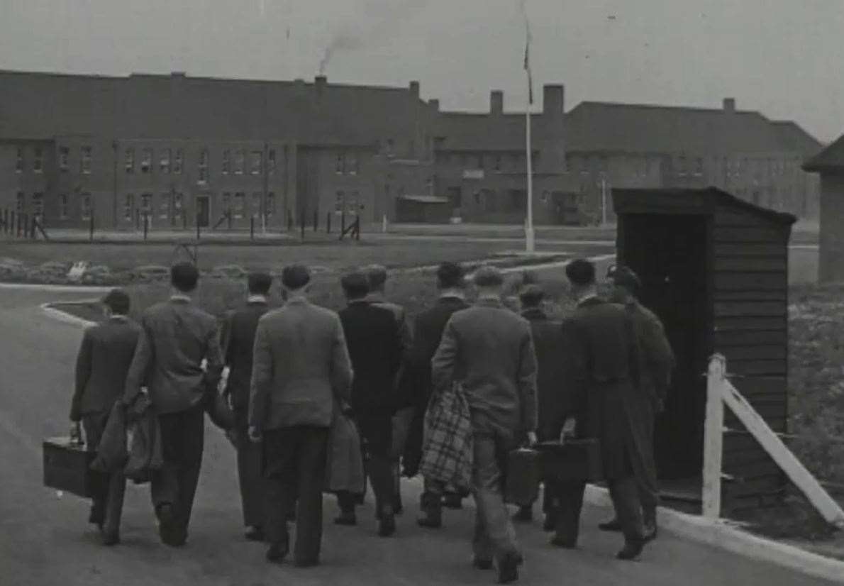 A draft of new National Service recruits arrives at barracks