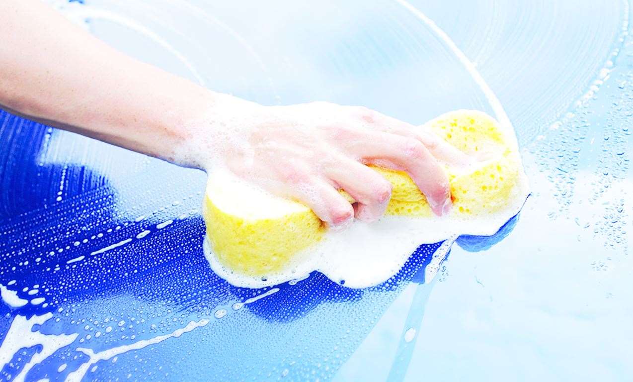 Car wash firms using a hose are still permitted to do so. Picture: Stock image.