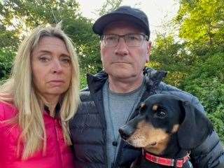 Mrs and Mr Ground with their dog, Henry, who survived the attack