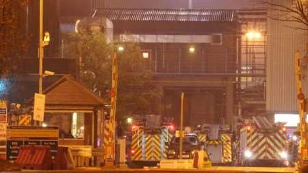 Crews keep watch over the damaged paper mill on Sunday night. Picture: Andy Payton