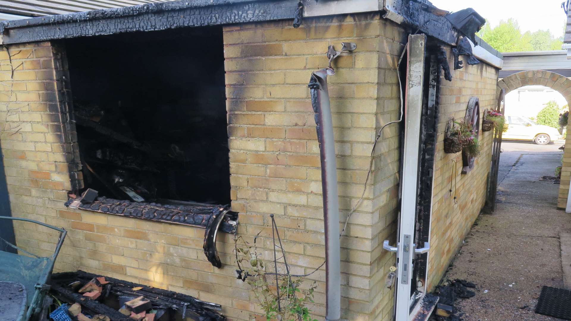 The garage was badly damaged by fire following a lightning strike