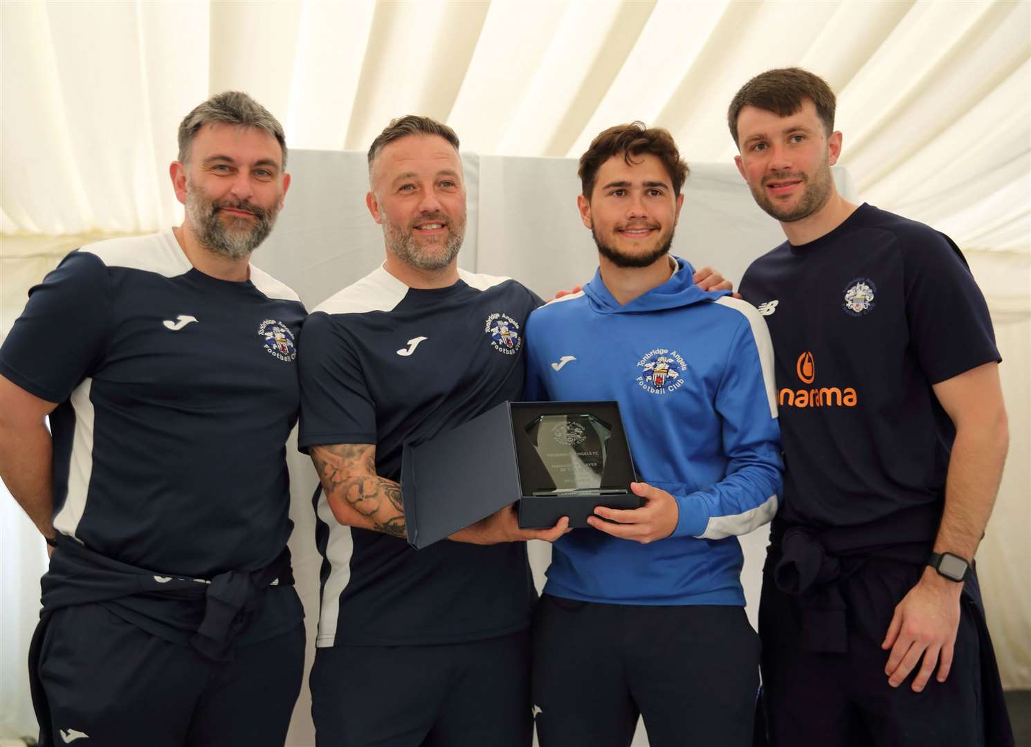 Manager's player-of-the-year Lewis Gard with assistant boss Lloyd Blackman, manager Jay Saunders and player-coach Tom Parkinson. Picture: David Couldridge