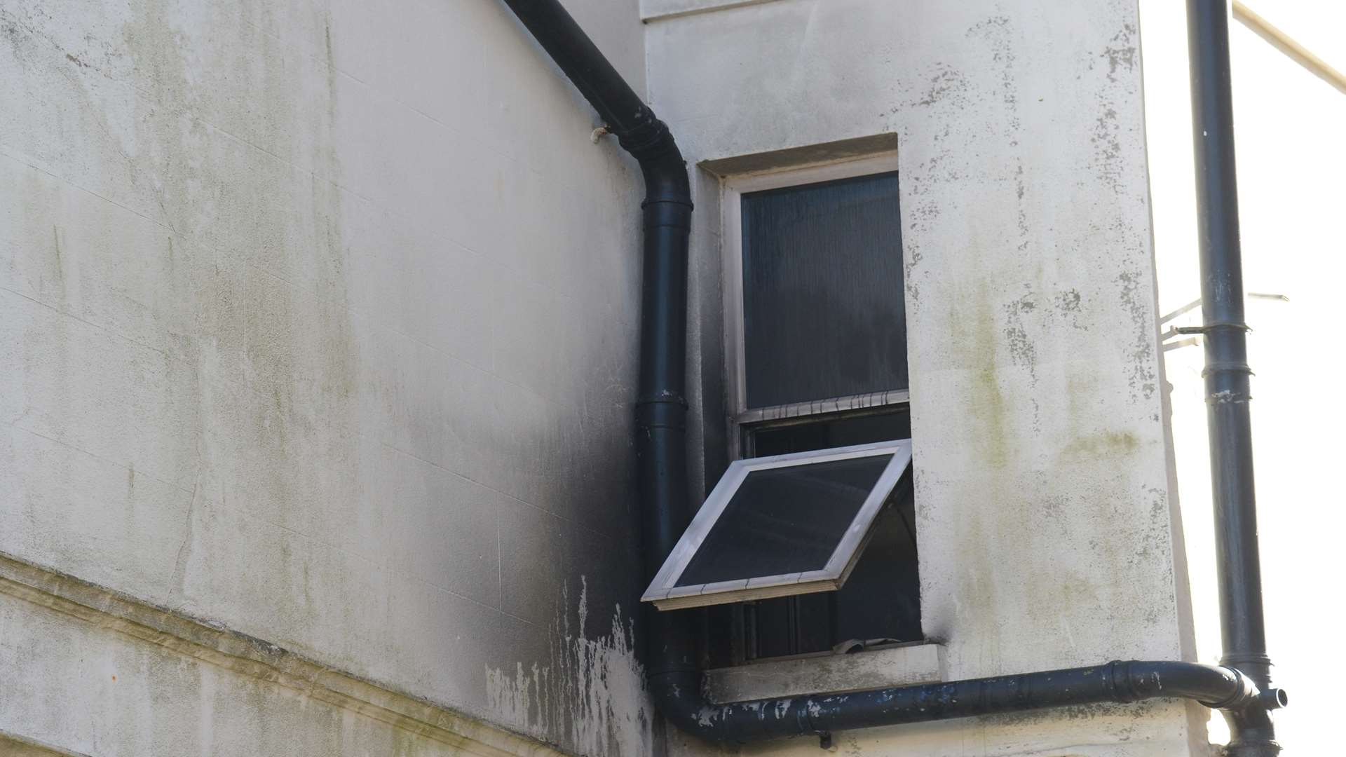 A burnt out window at the rear of the building. Picture: Gary Browne