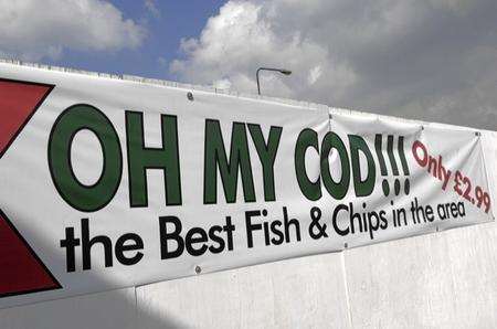 Banner advertising Del's Fish Bar in St Michaels