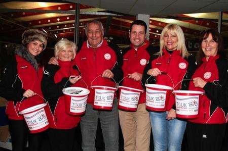 Athletes and their families collecting for the British Transplant Games at the Invicta Dynamos match