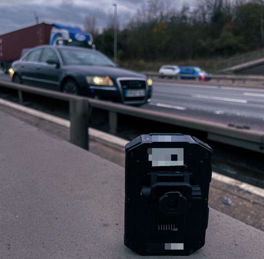 Police set up a body worn camera after a crash near the Dartford Crossing after spotting drivers using a mobile phone behind the wheel filming the incident. Picture: Kent Police