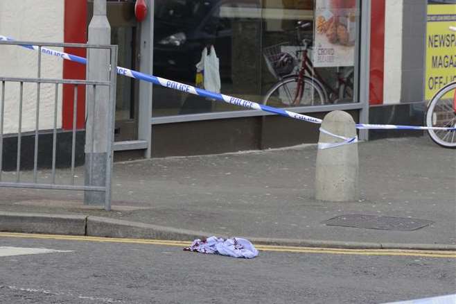 A blood-stained item of clothing outside KFC in Ashford