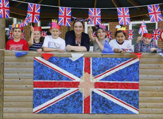 Pupils from years 3 and 4 enjoy a street party at Oaks Primary Academy. Picture: Andy Jones