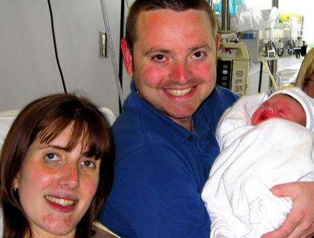 Lauren and Merlin Gard with baby Charlie - hours before Mrs Gard died after giving birth at Darent Valley Hospital