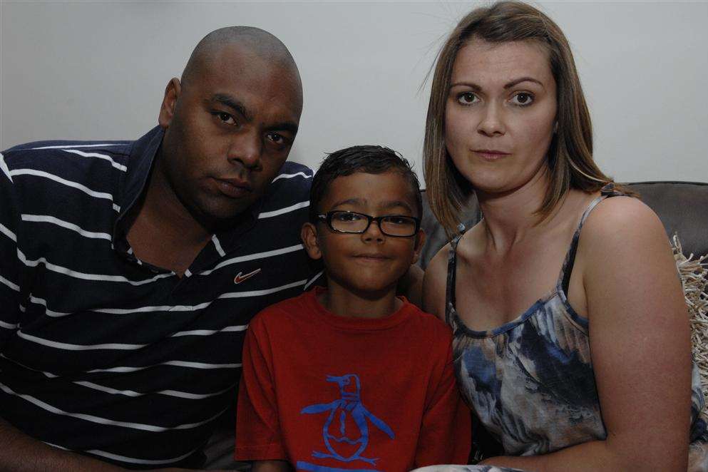 Kingsley Franklyn, with parents Andy and Sam, who had to dive out of the way of a speeding car near his home in Barnes Way, Reculver.