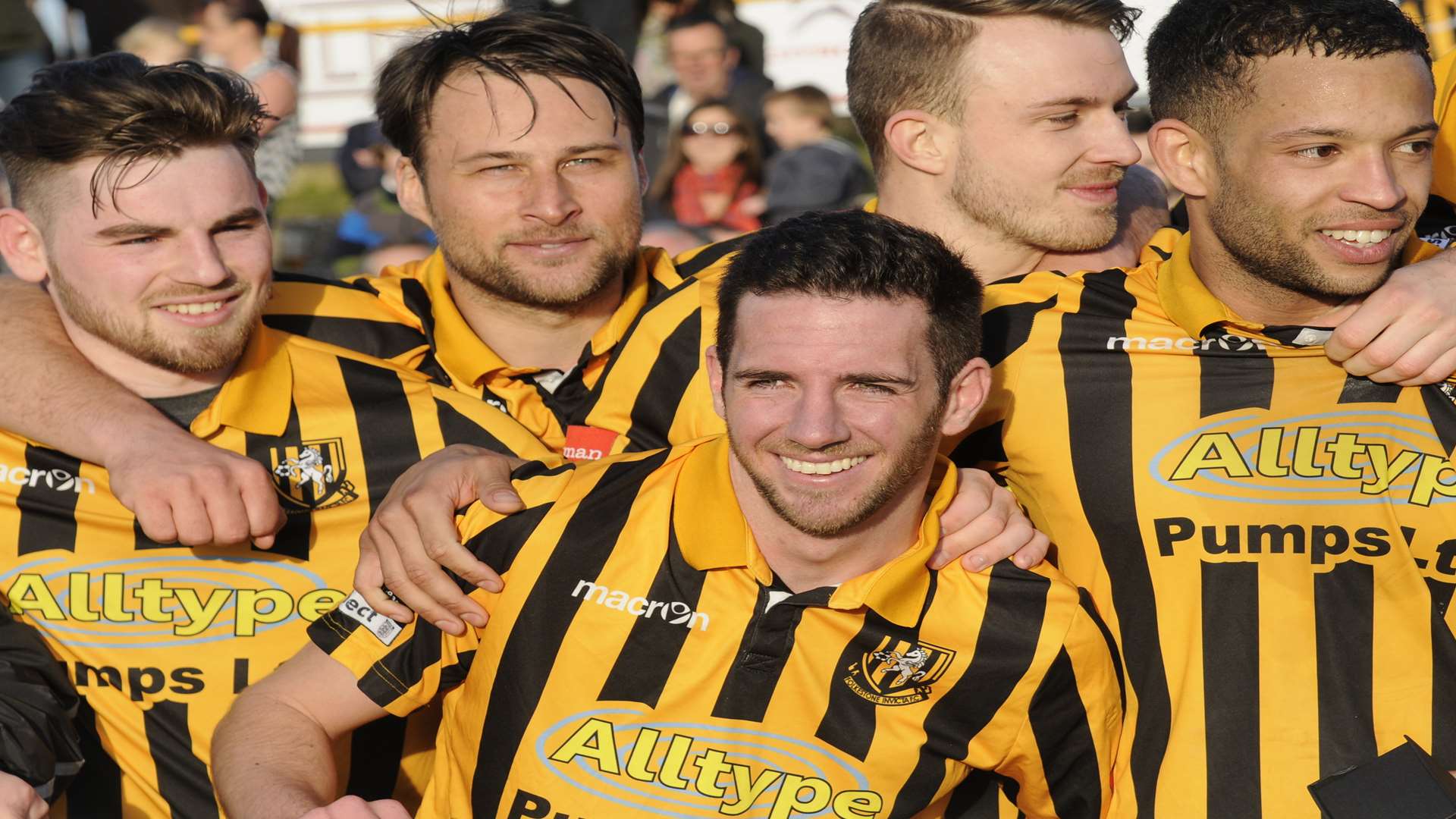 Ian Draycott (centre) celebrates the championship with his Folkestone team-mates Picture: Gary Browne