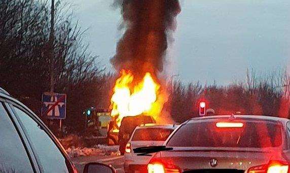 A vehicle on fire at the top of the exit slip on the London-bound M2 Junction 3 for Chatham and Maidstone Picture: Martyn Monk