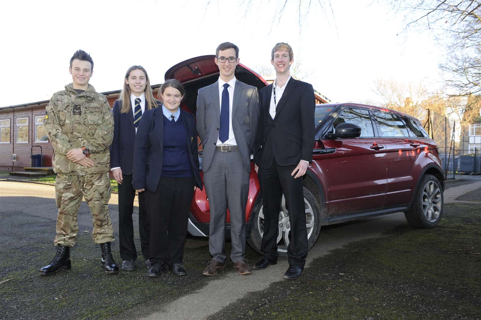 Jaguar Land Rover engineer Adam Crofts with Ted Missons, 15, Jonny Chapman,14, Beth Gwyer,15, and team leader Tom Wiltshire,16.