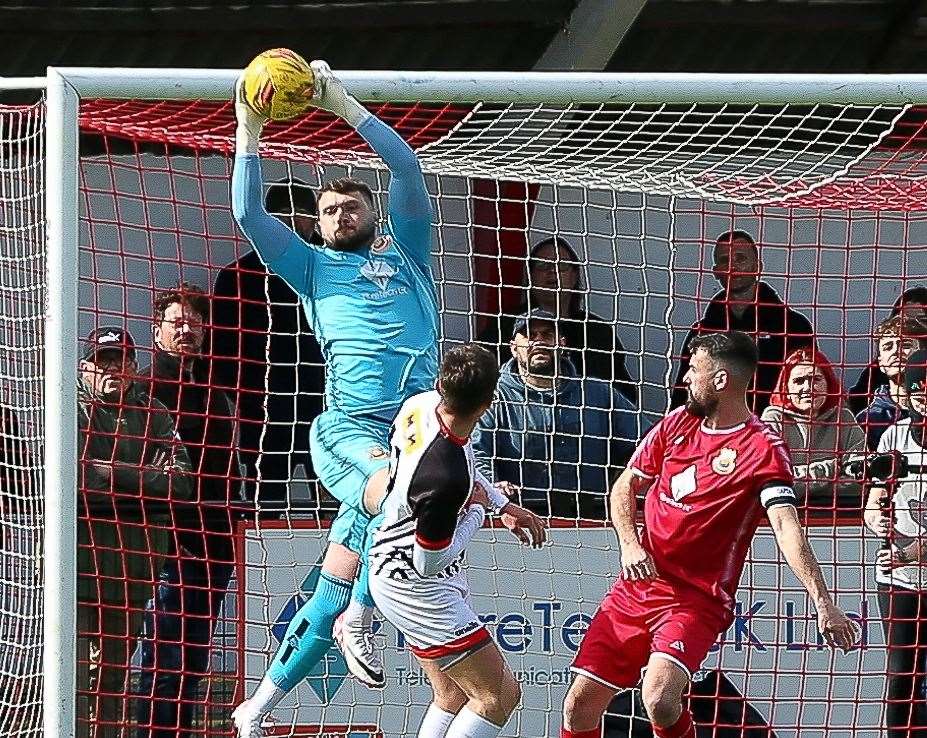 Whitstable keeper Jordan Perrin gathers confidently against Deal. Picture: Les Biggs