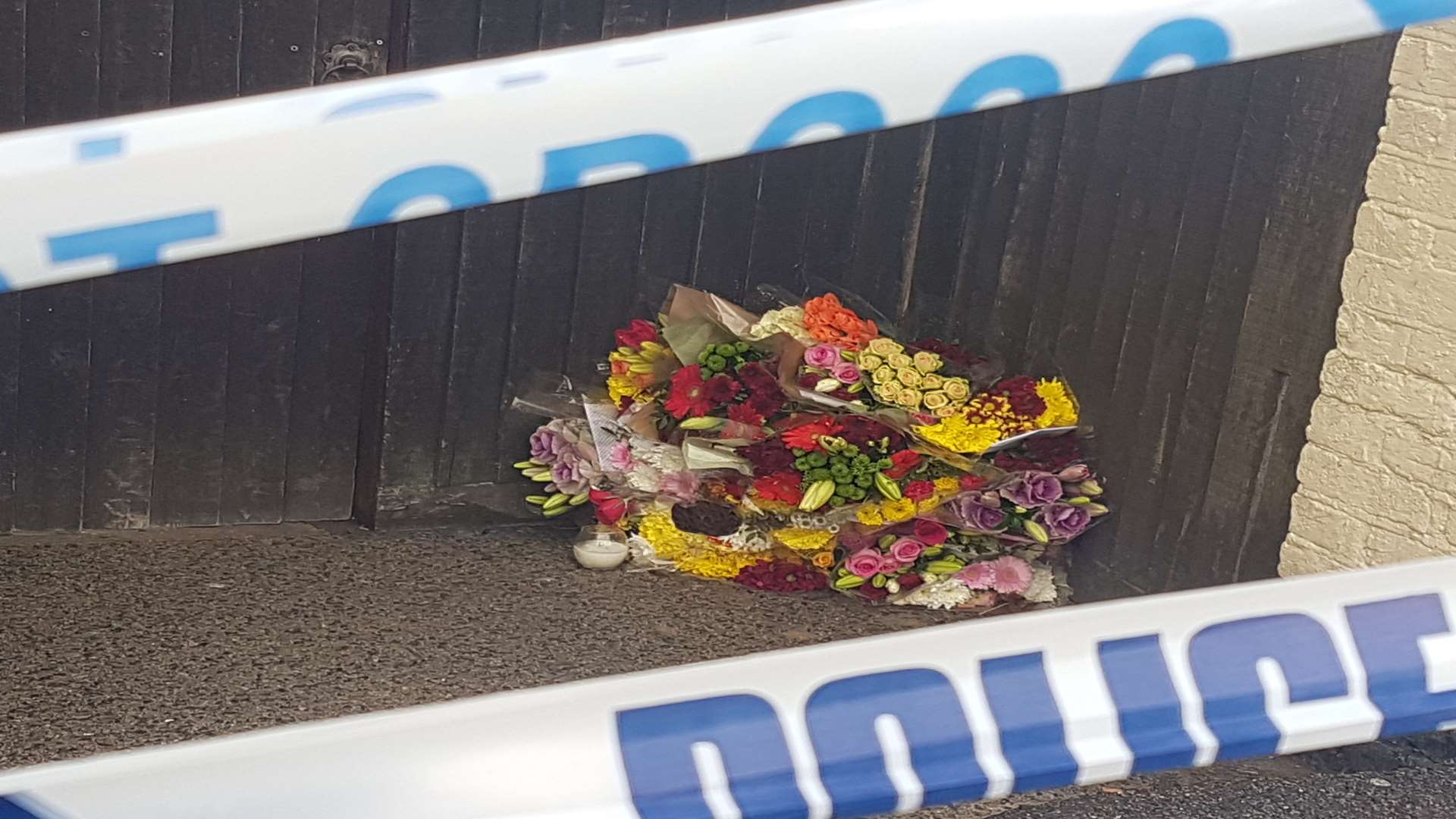 Floral tributes at the scene of the shooting