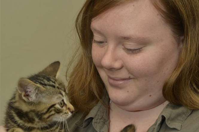 Cat owner Lauren Gavin cuddles miracle kitten Gollum after her spin