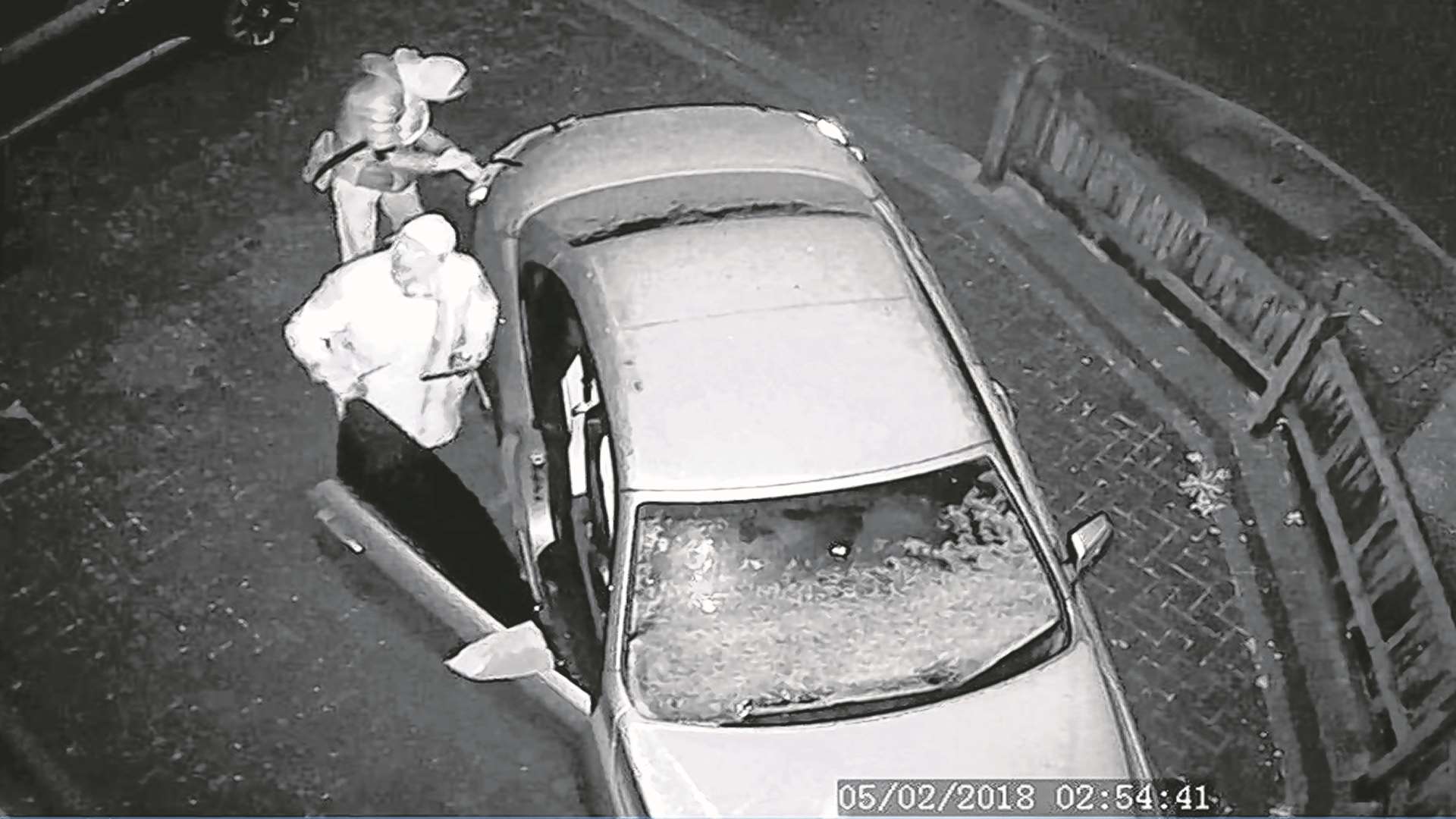 One thief then drilled into the driver's door to unlock the car.