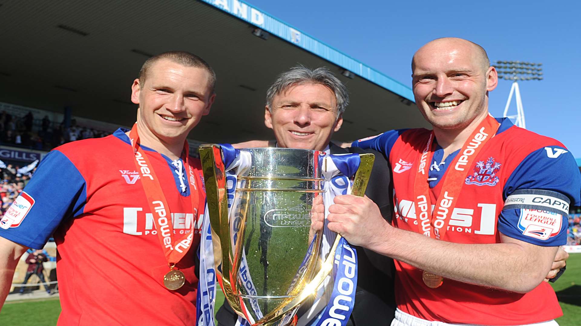 Andy Frampton, vice-chairman Michael Anderson and Adam Barrett when Gillingham were crowned champions of League 2 in 2013