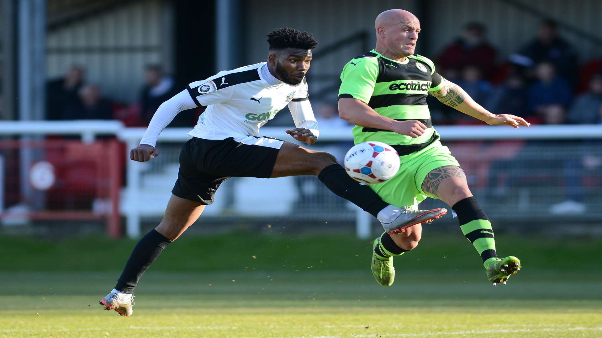 Dover's Tyrone Marsh and Forest Green's David Pipe challenge for the ball Pic: Gary Browne
