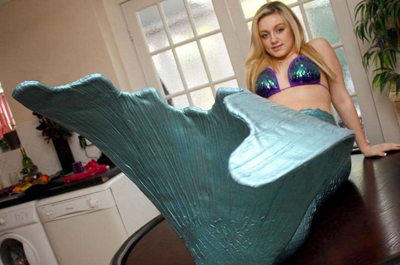 Budding professional mermaid Sophie Elphick is an unusual sight on the dining table at her Warden home