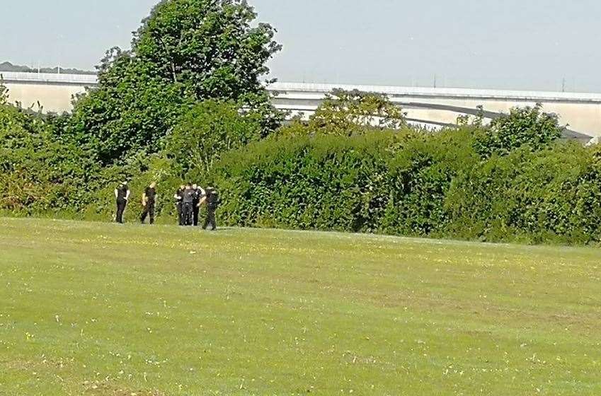 Police surround a young man in Borstal Recreational Ground (10790522)