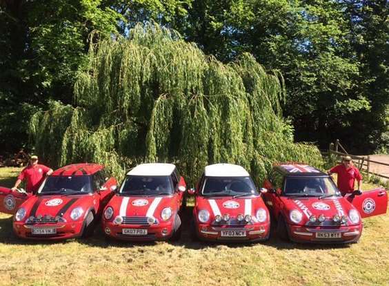 The Mini Red Arrows is a team of ten red minis and its owners