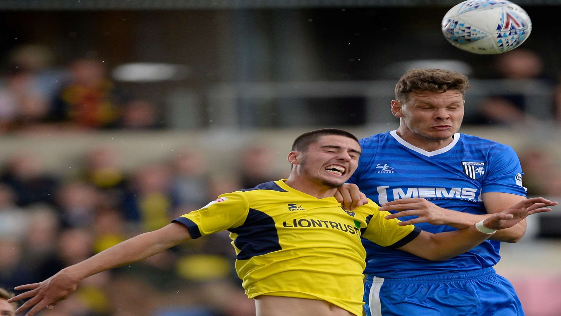 Ben Nugent competes against Oxford's John Mousinho. Picture: Ady Kerry
