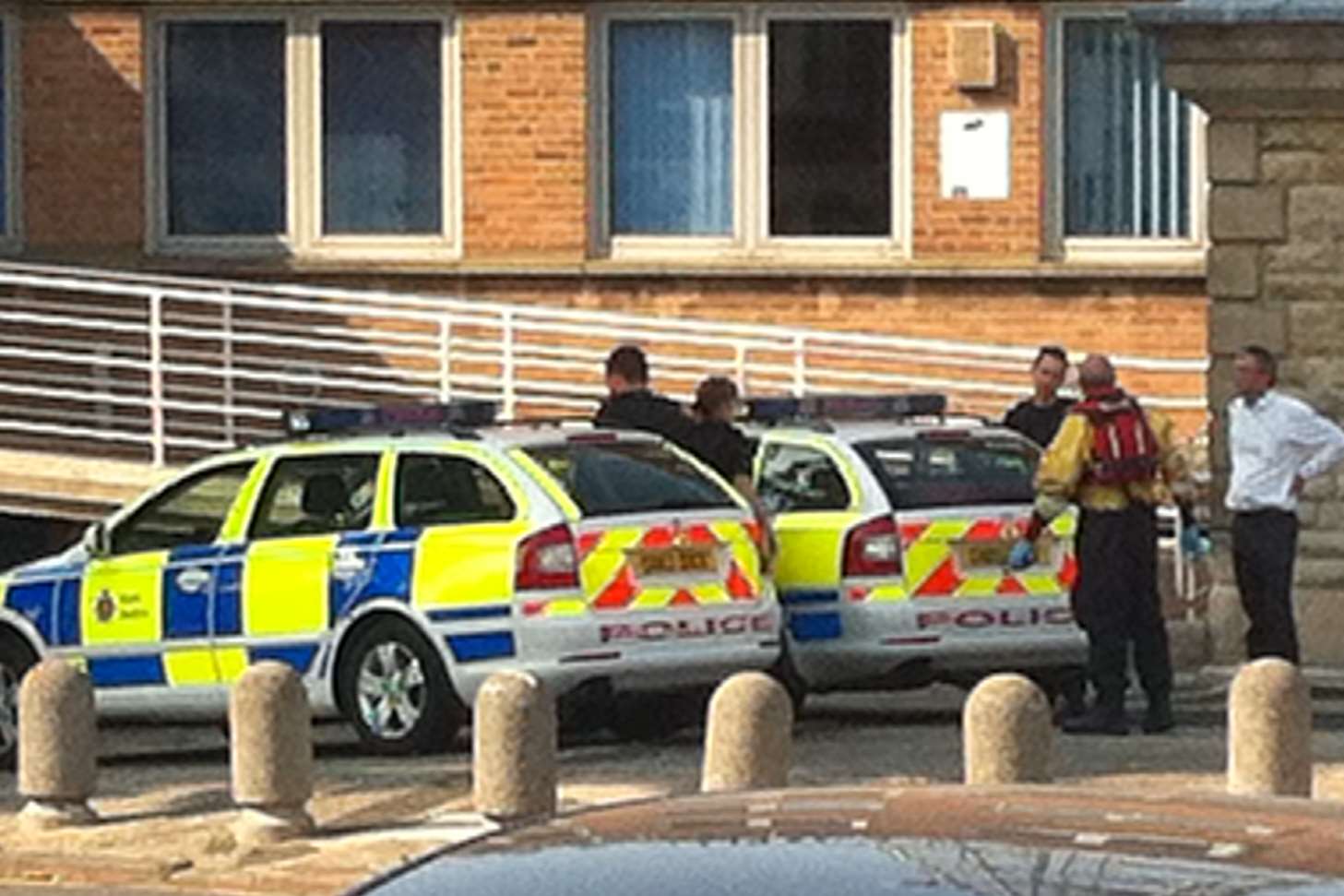 Police at Gravesend riverside after the discovery of a body