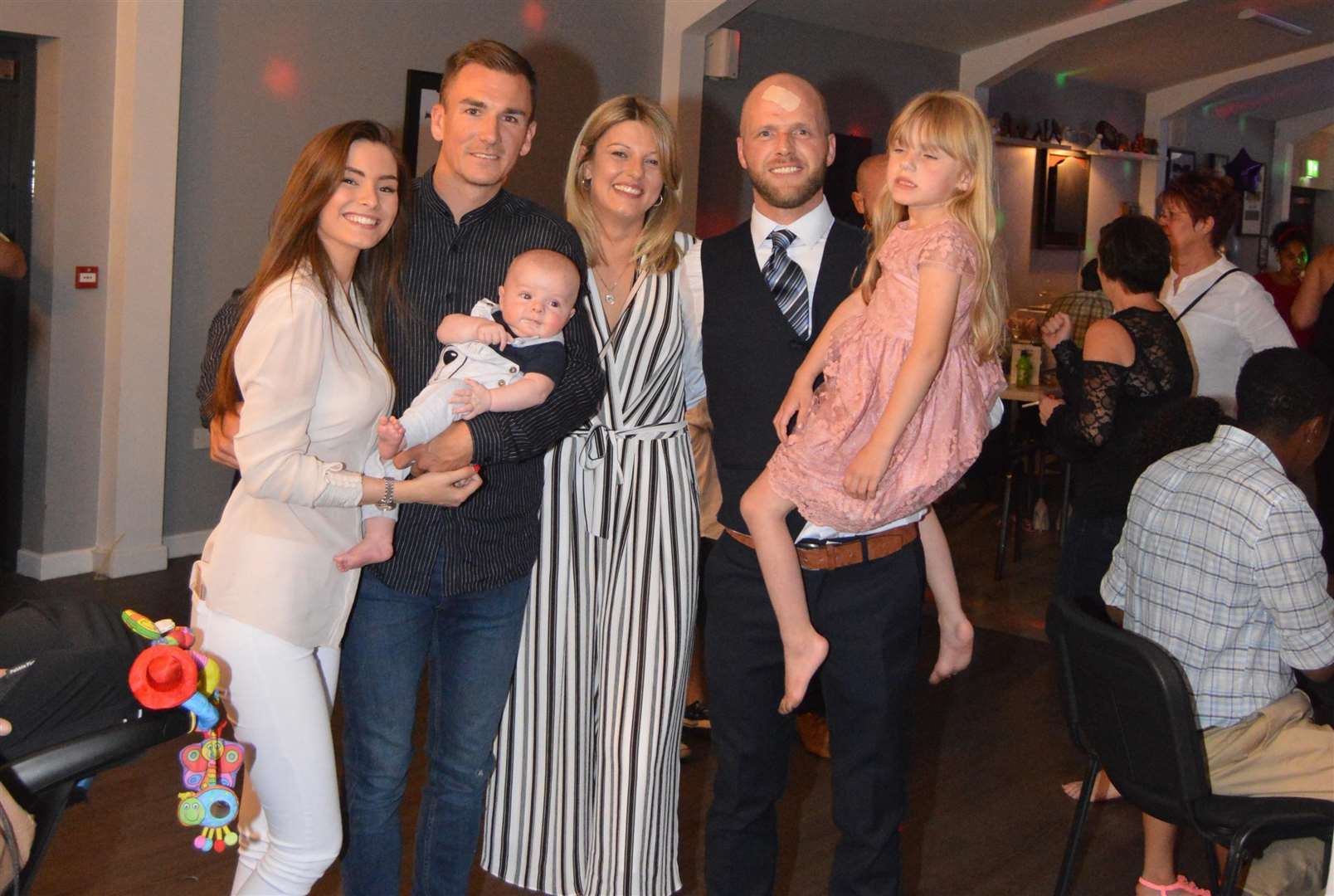 Footballer Jed Wallace, his partner Abbie and baby Luca joined the Barr family at the appreciation party in June