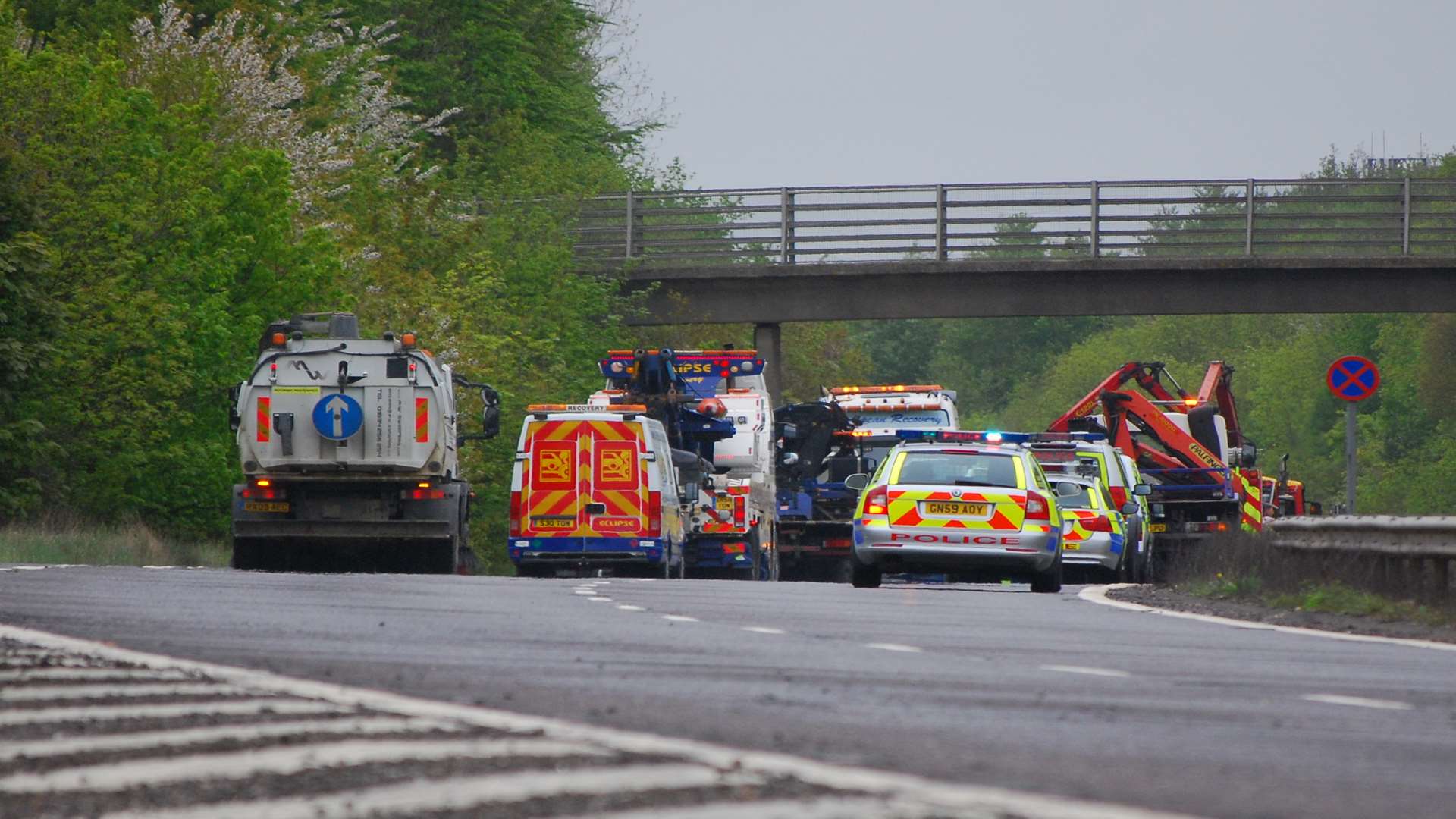 Emergency services at the scene after a lorry hit a bridge on the A2 near Canterbury