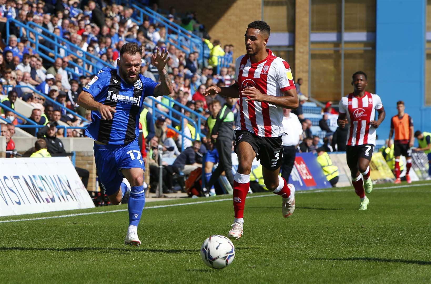Danny Lloyd gives chase for Gillingham. Picture: Andy Jones (49990660)