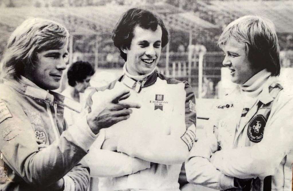 Tony Brise, centre, talks with James Hunt, left, and Swede Ronnie Peterson at the Italian Grand Prix in September 1975