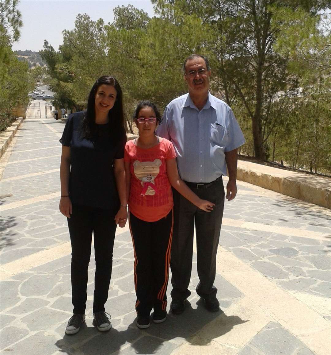 Kristy, pictured centre with left, sister Lina and right, dad, Saiel Saleh. Photo:Christina Saleh's family