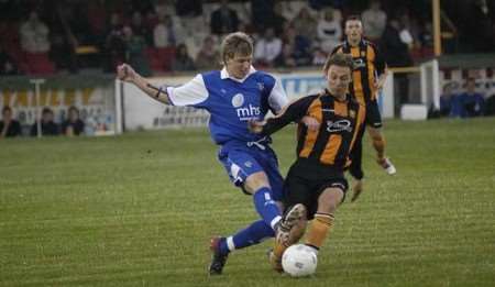TUSSLE: Gillingham's Dean Beckwith in determined mood on Wednesday night. Picture: GARY BROWNE
