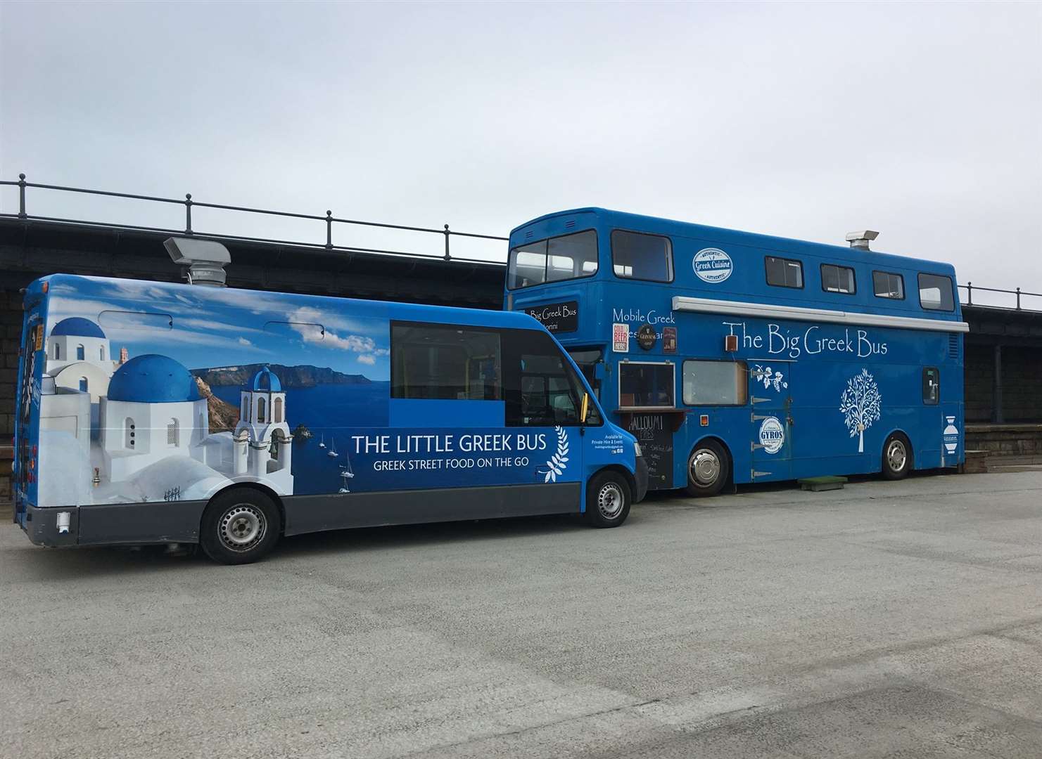 The Big Greek Bus with its little sister on Folkestone Harbour Arm. Picture: The Big Greek Bus