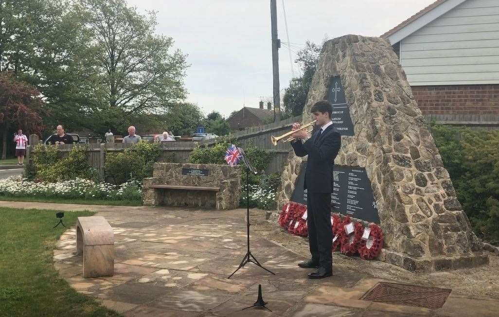 Trumpeter Sam Loader, 16, at Aldington war memorial for VE Day 75. Picture: Alison Baldwin