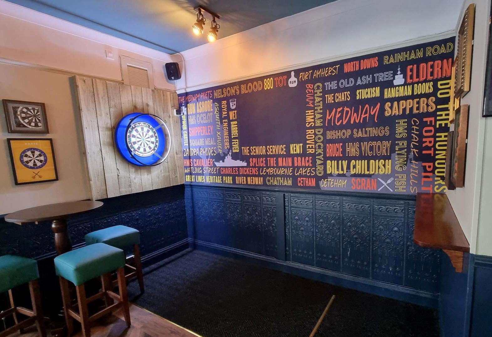 A dartboard and pool table have been set up for customers. Picture: Grant Sanders