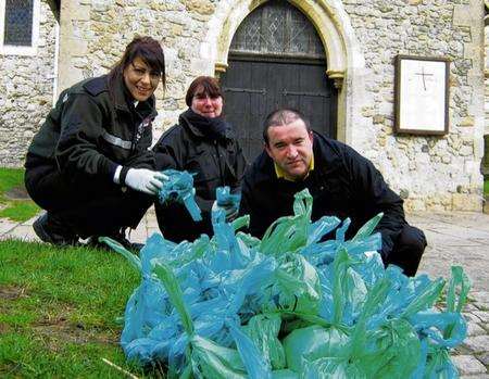 Wardens Faye Mahoney, Maxine Jacobs and Jeff Payne with the dog mess collected at Minster Abbey