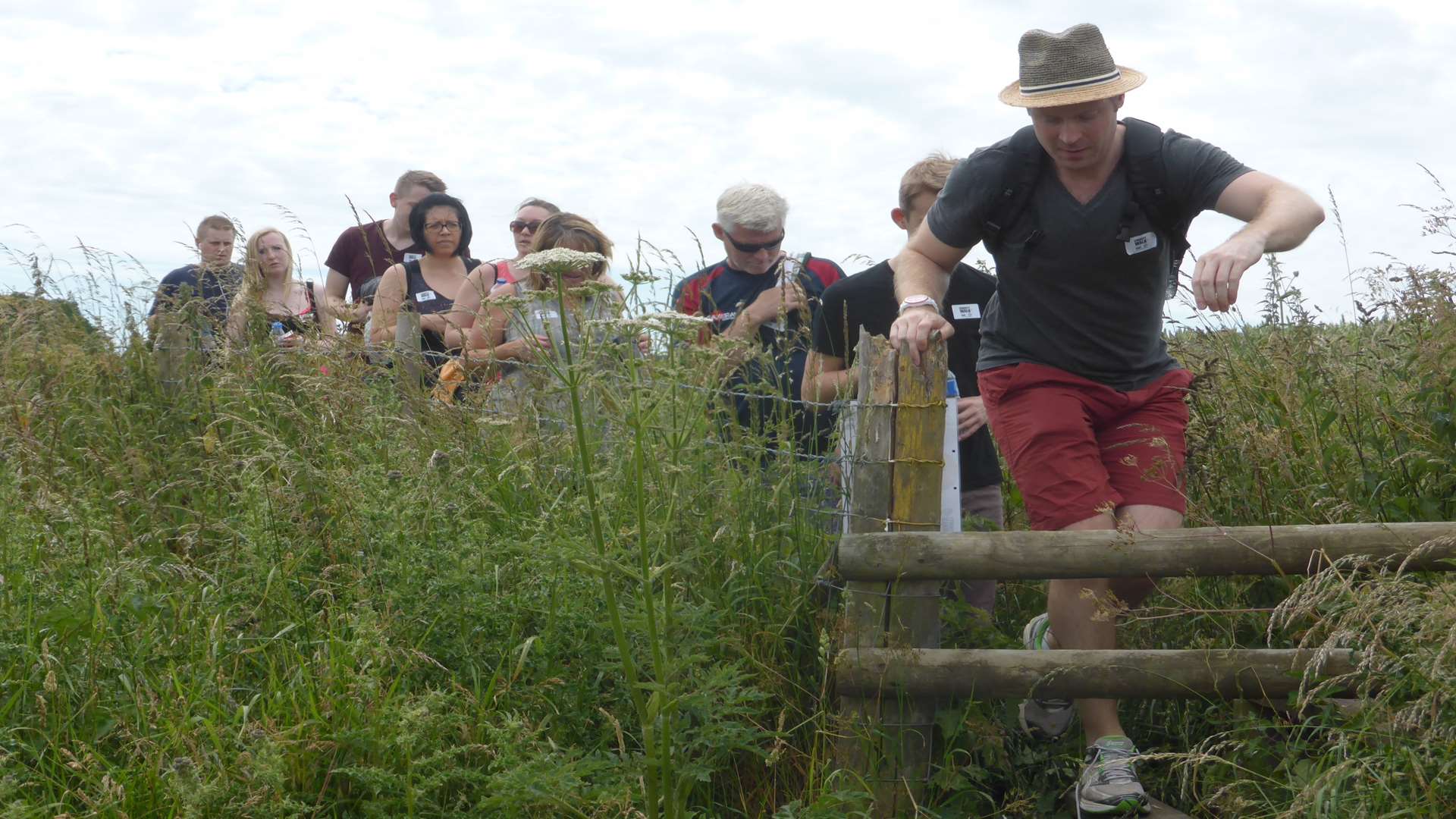 Walkers trek onwards at the KM Charity Walk last year. Booking for the 21st anniversary walk staged at Mote Park, Maidstone on Sunday, June 26 is now open.