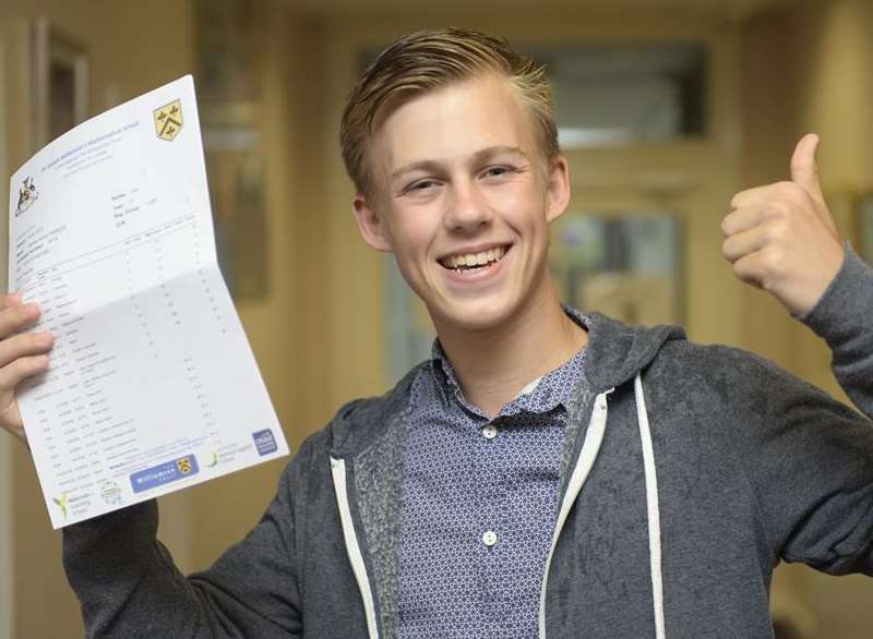 Rochester Math pupil James Parker picks up his results. Library image.