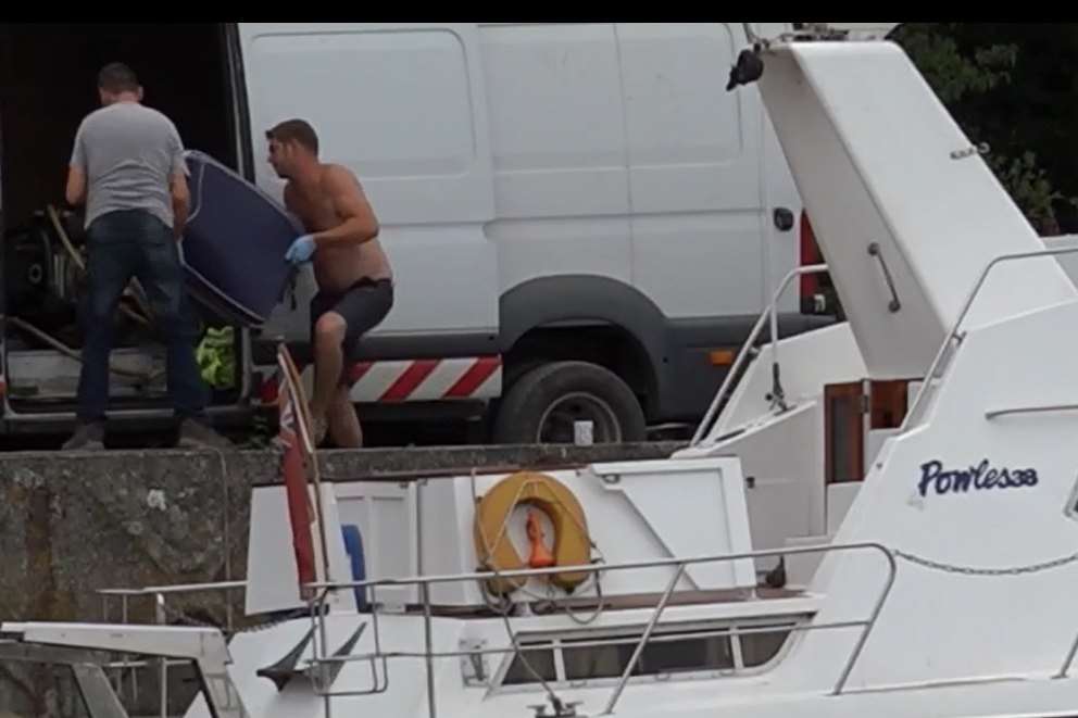 The guns being unloaded from the boat. Picture National Crime Agency
