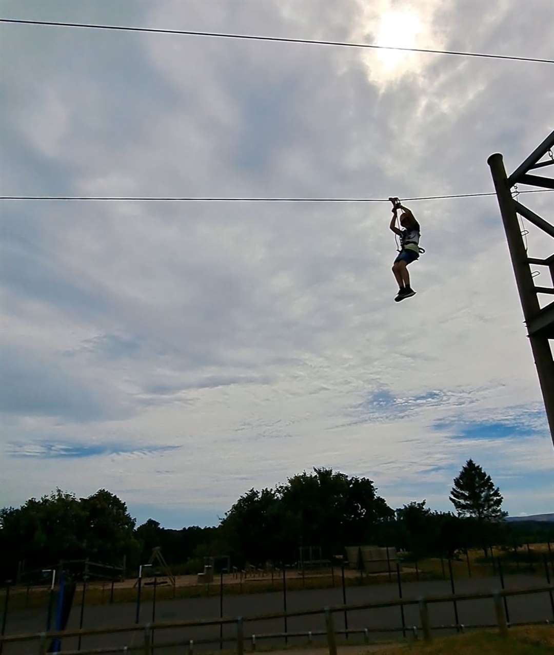 My son sets off on the zipline