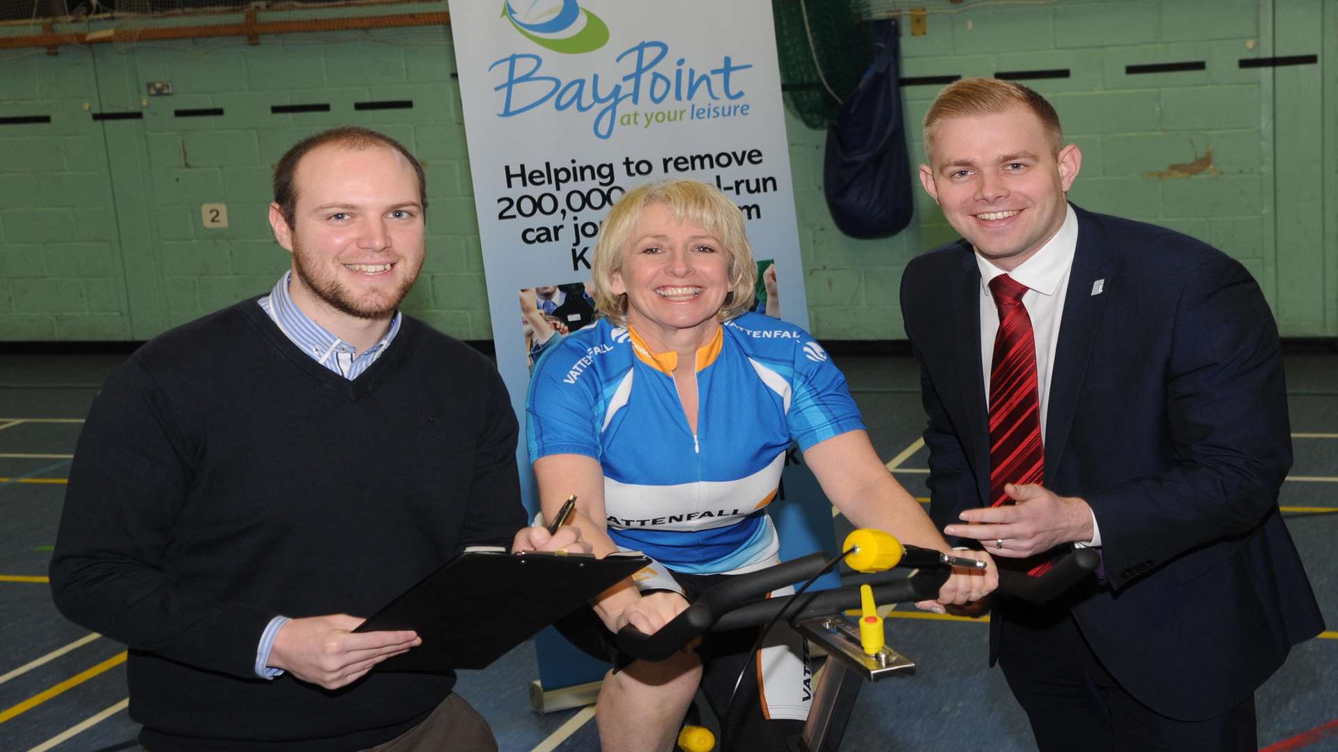 Sam Perkins of BayPoint (left) and Adam Smith of BMW put Vattenfall's Mel Rogers through her paces ahead of the KM Big Bike Ride on April 26.