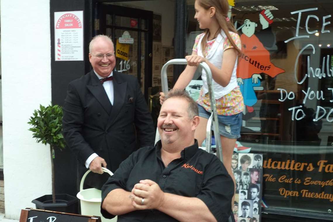 Big-hearted barber Kevin Almond prepares to take the ice bucket challenge last month